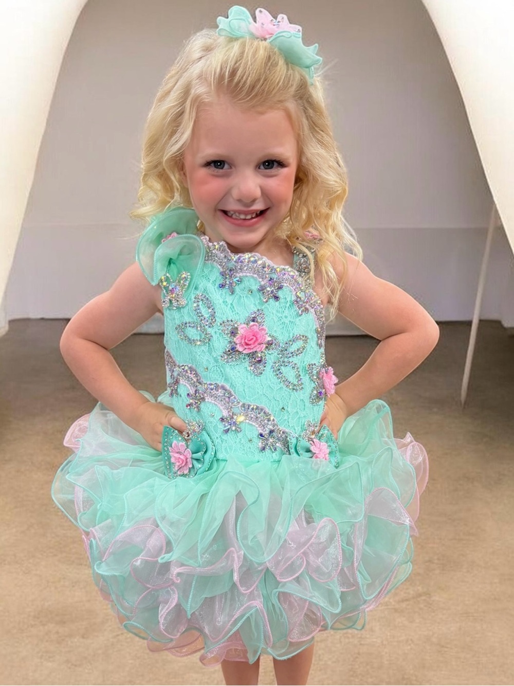 Jennifer Wu Mint Cupcake rhinestone pageant dress with Pink Floral Accents.